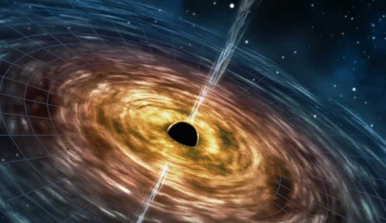 Illustrazione di un buco nero supermassiccio (Depositphotos foto) - www.aerospacecue.it